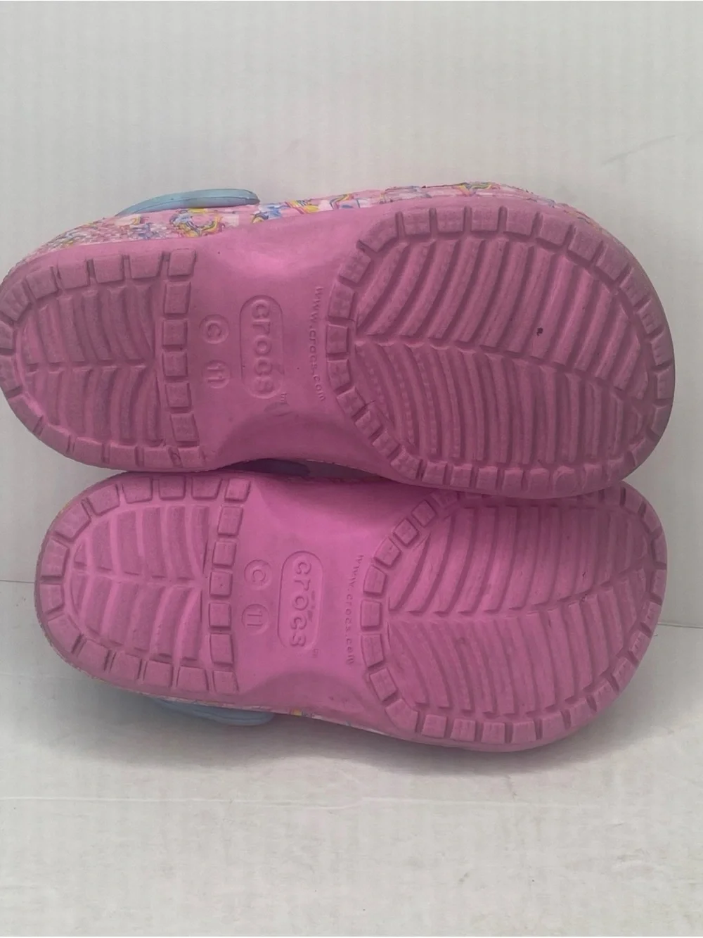 CROCS Pink Rainbow Print Clogs with Blue Heel Strap